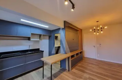 Apartamento semi mobiliado com 02 quartos sendo 01 suíte e sacada com churrasqueira no bairro Anita Garibaldi