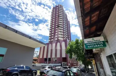 Apartamento no bairro Centro semimobiliado com 2 quartos, sacada e elevadores e 1 vaga de garagem coberta.