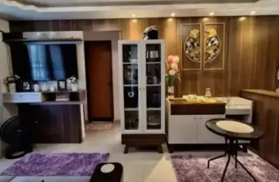 Vendo lindo apartamento com tres quartos segundo andar  com garagem em frente ao bloco