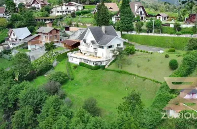Casa com 6 dormitórios à venda, 600 m² por r$ 2.800.000,00 - alto do capivari - campos do jordão/sp