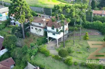 Casa com 7 dormitórios à venda, 502 m² por r$ 1.800.000,00 - vila capivari - campos do jordão/sp