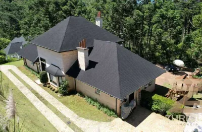 Casa com 4 dormitórios à venda, 315 m² por r$ 3.700.000,00 - condomínio recanto do sol - campos do jordão/sp