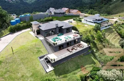 Casa com 5 dormitórios à venda, 448 m² por r$ 6.900.000,00 - vila medica - campos do jordão/sp