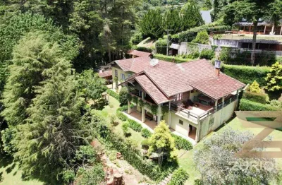 Casa com 6 dormitórios à venda, 478 m² por r$ 3.800.000,00 - vila porã - campos do jordão/sp