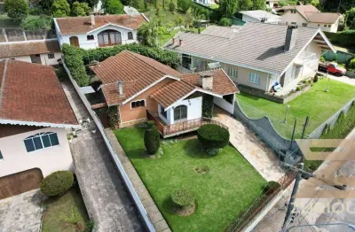 Casa com 5 dormitórios à venda, 291 m² por r$ 1.300.000,00 - abernéssia - campos do jordão/sp