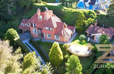 Casa com 6 dormitórios à venda, 455 m² por r$ 3.200.000,00 - capivari - campos do jordão/sp