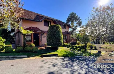 Casa com 6 dormitórios à venda, 386 m² por r$ 3.950.000,00 - alto do capivari - campos do jordão/sp