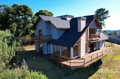 Casa com 3 dormitórios à venda, 250 m² por r$ 2.850.000,00 - alto do capivari - campos do jordão/sp