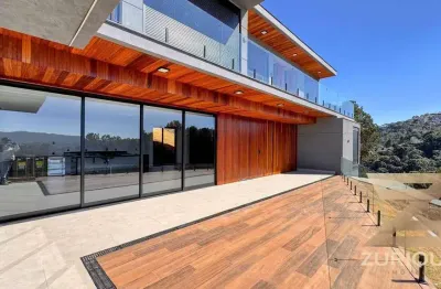 Casa com 4 dormitórios à venda, 450 m² por r$ 7.900.000,00 - condomínio iporanga - campos do jordão/sp