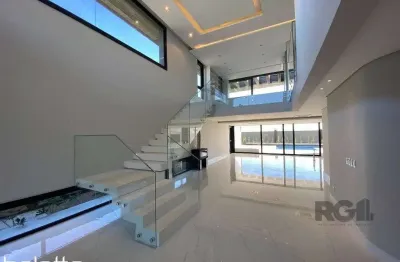 Casa para comprar no condomínio ponta da figueira - marina com 4 suítes