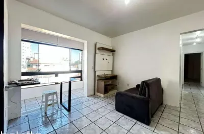 Apartamento 2 dormitórios (1 suite) , sacada , garagem , centro de torres