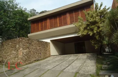 Casa em condomínio fechado à venda, 400m2., 5 dormitórios sendo 3 suites.