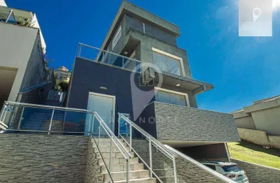 Casa com 4 dormitórios à venda, 371 m² por r$ 2.450.000,00 - alphasítio - santana de parnaíba/sp