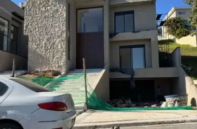 Casa em construção entregue mobiliada e decorada com 4 dormitórios à venda, 520 m² por r$ 6.900.000 - gênesis 2 - santana de parnaíba/sp