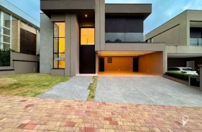 Casa de luxo à venda no condomínio gênesis 1, alphaville – 4 suítes, piscina e infraestrutura completa