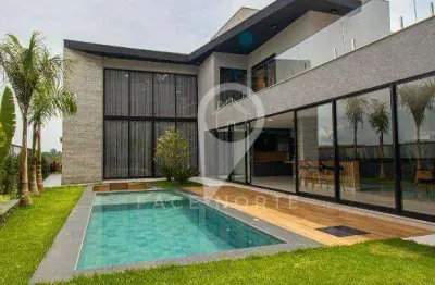 Casa nova em alphaville, ambientes integrados,4 suítes c/ vista p/ mata! piscina c/ prainha!
