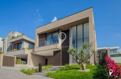 Linda casa nova mobiliada com 5 dormitórios, sendo 4 suítes à venda, 411 m² por r$ 7.990.000 - alphaville - santana de parnaíba/sp