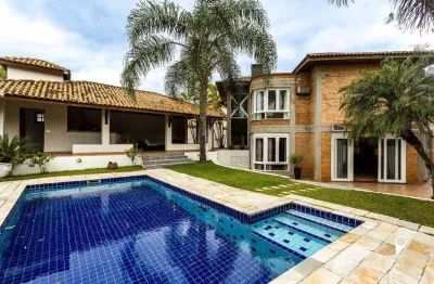 Casa mobiliada de alto padrão em tamboré 3 — 4 suítes, 750 m² de área construída