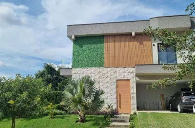 Casa mobiliada e decorada com vista para área preservada – 4 suítes, piscina infinita e total privacidade