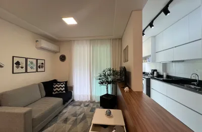 Apartamento mobiliado com 74 m², 3 dormitórios (1 suíte), sacada com churrasqueira e vista para área de preservação. living integrado, ótima lavanderia e móveis planejados.