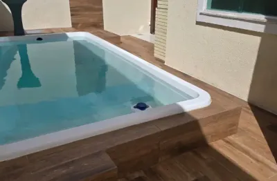 Casa em condomínio fechado com 4 quartos para alugar na Rua Caraíva, Abrantes, Camaçari