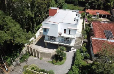 Maravilhosa casa com 4 quartos e linda vista para o lago. granja viana, condominio palos verdes.