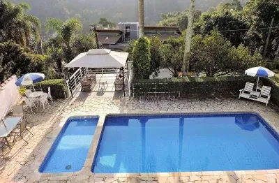 Casa com 5 dormitórios à venda, 557 m² por R$ 2.000.000,00 - Granja Viana - Carapicuíba/SP