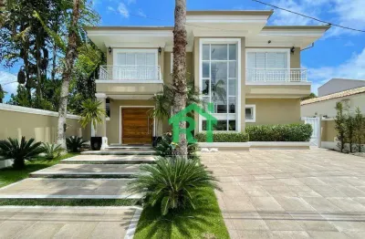 Casa à venda com 4 dormitórios (4 suítes), 4 vagas, área de lazer, jardim acapulco, guarujá/sp