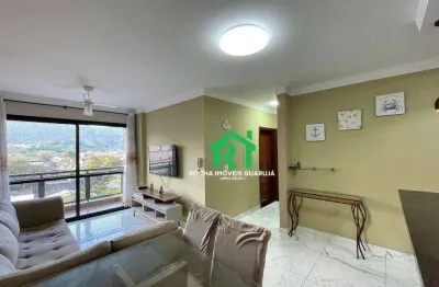 Apartamento com 2 dormitórios, 1 sendo suite na praia da enseada com lazer.