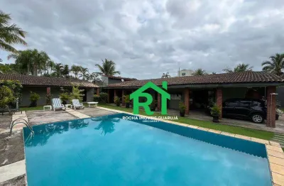 Casa à beira mar com 5 quartos (3 suítes), 6 vagas e lazer à venda em Pernambuco, Guarujá