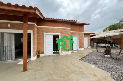 Casa à beira mar com 3 quartos (1 suíte), 3 vagas e lazer à venda em Enseada, Guarujá