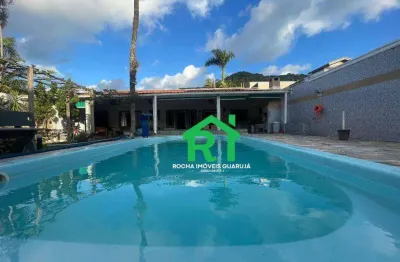 Casa Penthouse com 5 Quartos (2 Suítes),  6 Vagas e Lazer, à venda na Praia do Guaiuba, Guarujá.