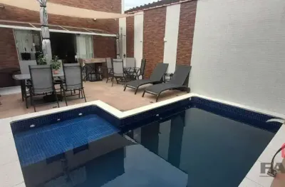 Casa com 4 quartos à venda na rua doutor júlio prestes, 896, vila valença, são vicente por r$ 1.200.000