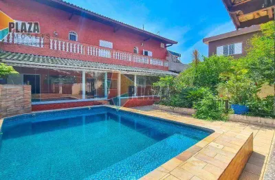 Casa 4 dormitórios com 3 suítes à venda, 310 m² por r$ 1.100.000,00- nova mirim - praia grande/sp
