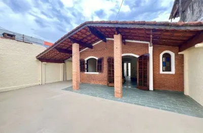Casa com 2 dormitórios à venda, 107 m² por R$ 960.000,00 - Vila Guilhermina - Praia Grande/SP