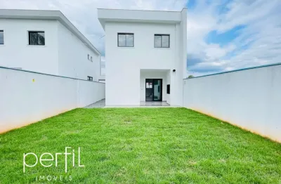Sobrado a venda em condomínio fechado com três quartos no bairro vila nova - joinville/ sc