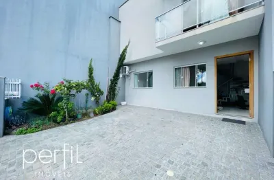Sobrado geminado a venda com três suítes no bairro guanabara - joinville/ sc