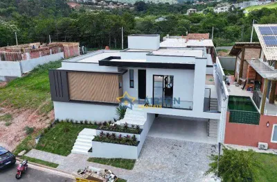 Casa de alto padrão com 3 suítes e piscina em condomínio fechado em atibaia