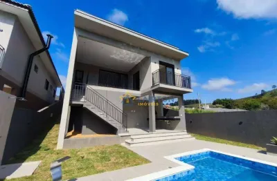 Casa à venda em atibaia com 3 suítes, piscina aquecida e cozinha com ilha – sofisticação e conforto