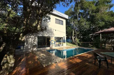 Casa em condomínio fechado à venda em atibaia com piscina e bosque