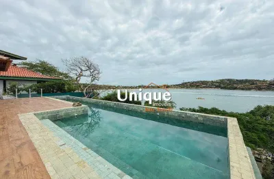 Casa pé na areia com 8 suítes à venda em búzios por r$ 8.500.000,00