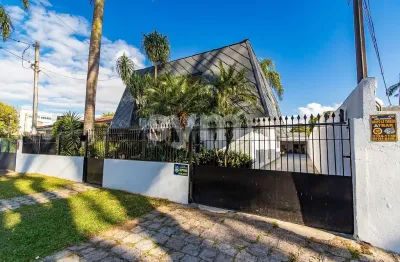 Casa com 4 quartos à venda na rua deputado carneiro de campos, 170, hugo lange, curitiba por r$ 1.680.000