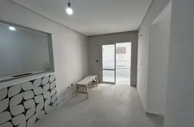 Apartamento com 2 dormitórios à venda, 63 m² por R$ 703.725,75 - Vila Guilhermina - Praia Grande/SP