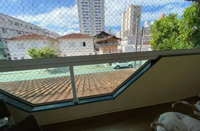 Sobrado com 3 dormitórios à venda, 154 m² por r$ 750.000,00 - tupi - praia grande/sp