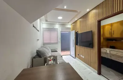 Casa em condomínio fechado com 2 quartos para alugar na Rua Esportista Ademilson Coelho, 171, Vila Assunção, Praia Grande