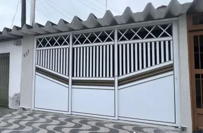 Casa com 2 dormitórios à venda, 71 m² por R$ 585.000,00 - Maracanã - Praia Grande/SP