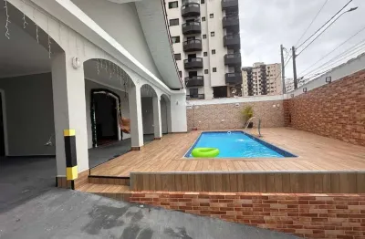 Casa com 3 dormitórios à venda, 157 m² por R$ 1.550.000,00 - Vila Guilhermina - Praia Grande/SP