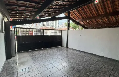 Casa com 3 dormitórios à venda, 71 m² por R$ 590.000,00 - Vila Guilhermina - Praia Grande/SP