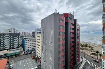 Apartamento com 2 dormitórios à venda, 55 m² por R$ 500.000,00 - Mirim - Praia Grande/SP