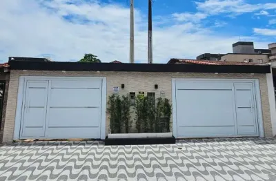 Casa com 2 dormitórios à venda, 138 m² por R$ 590.000,00 - Tupi - Praia Grande/SP